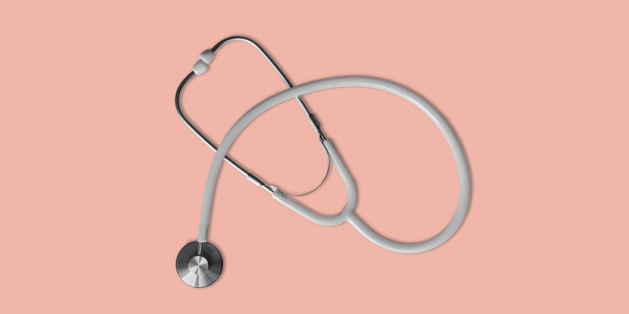 Stethoscope on peach background. Naltrexone side effects