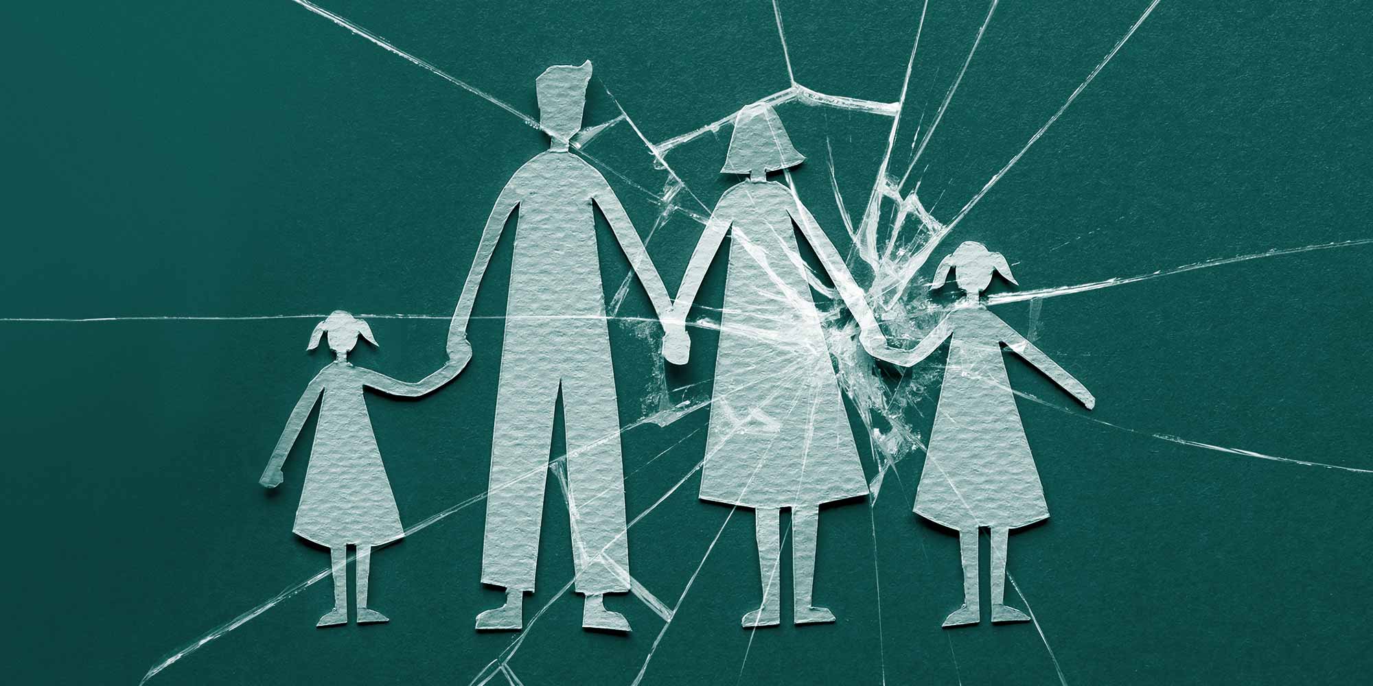 Adult-Child-of-an-Alcoholic_Blog Paper cutouts of a family holding hands, with cracked glass centered over mother and daughter. Adult child of an alcoholic